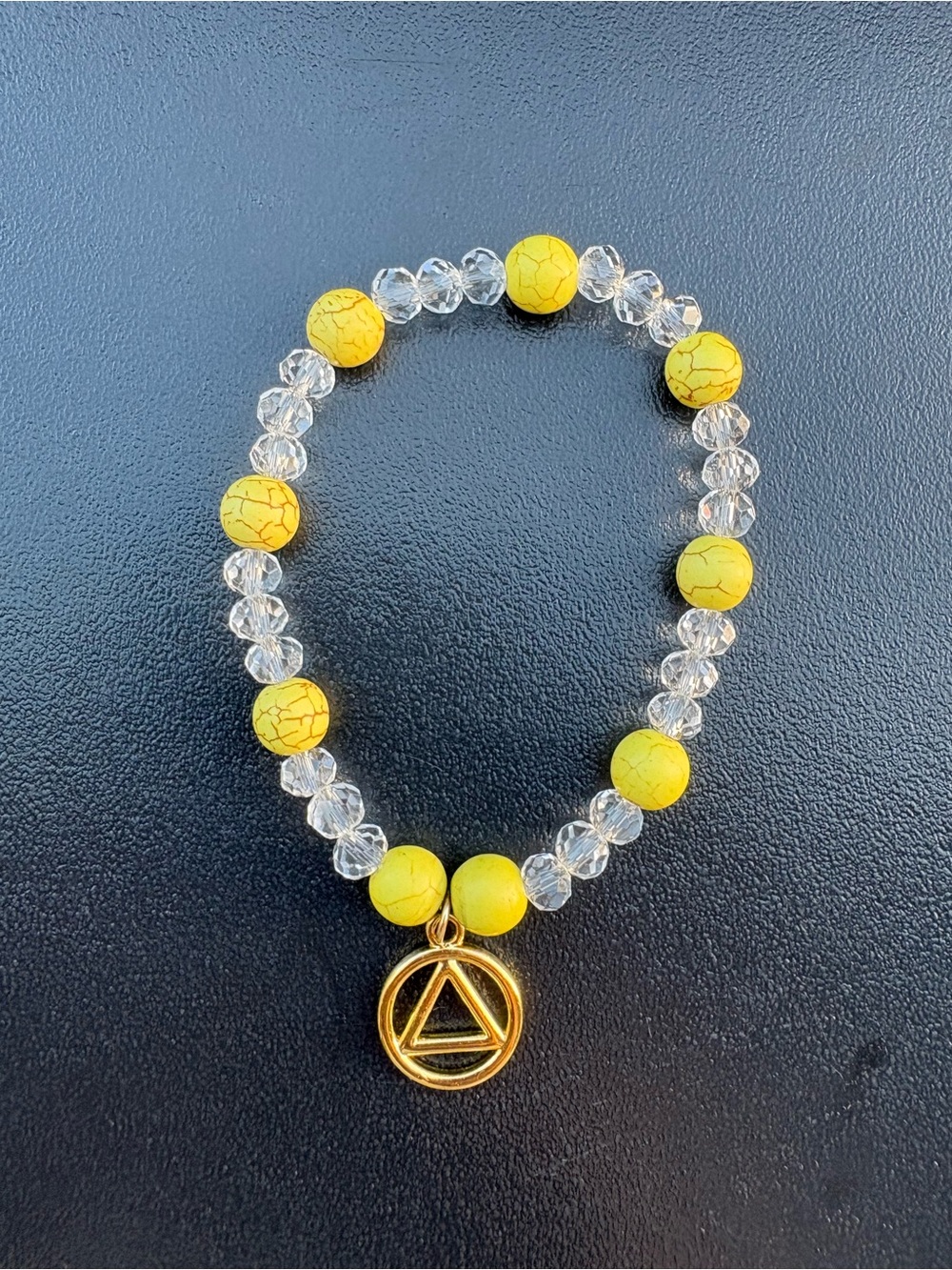 Yellow and Clear Beaded Stretch Bracelet with Gold Triangle Charm
